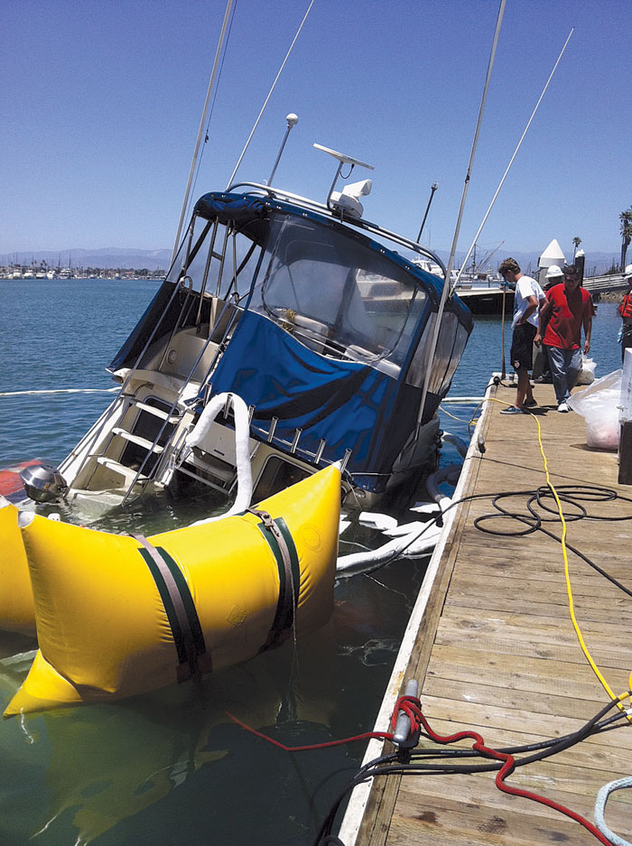 Boat Hits Breakwater, Then Sinks at County Dock