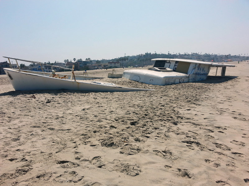 City and county officials to pay $227,500 to remove beached boat