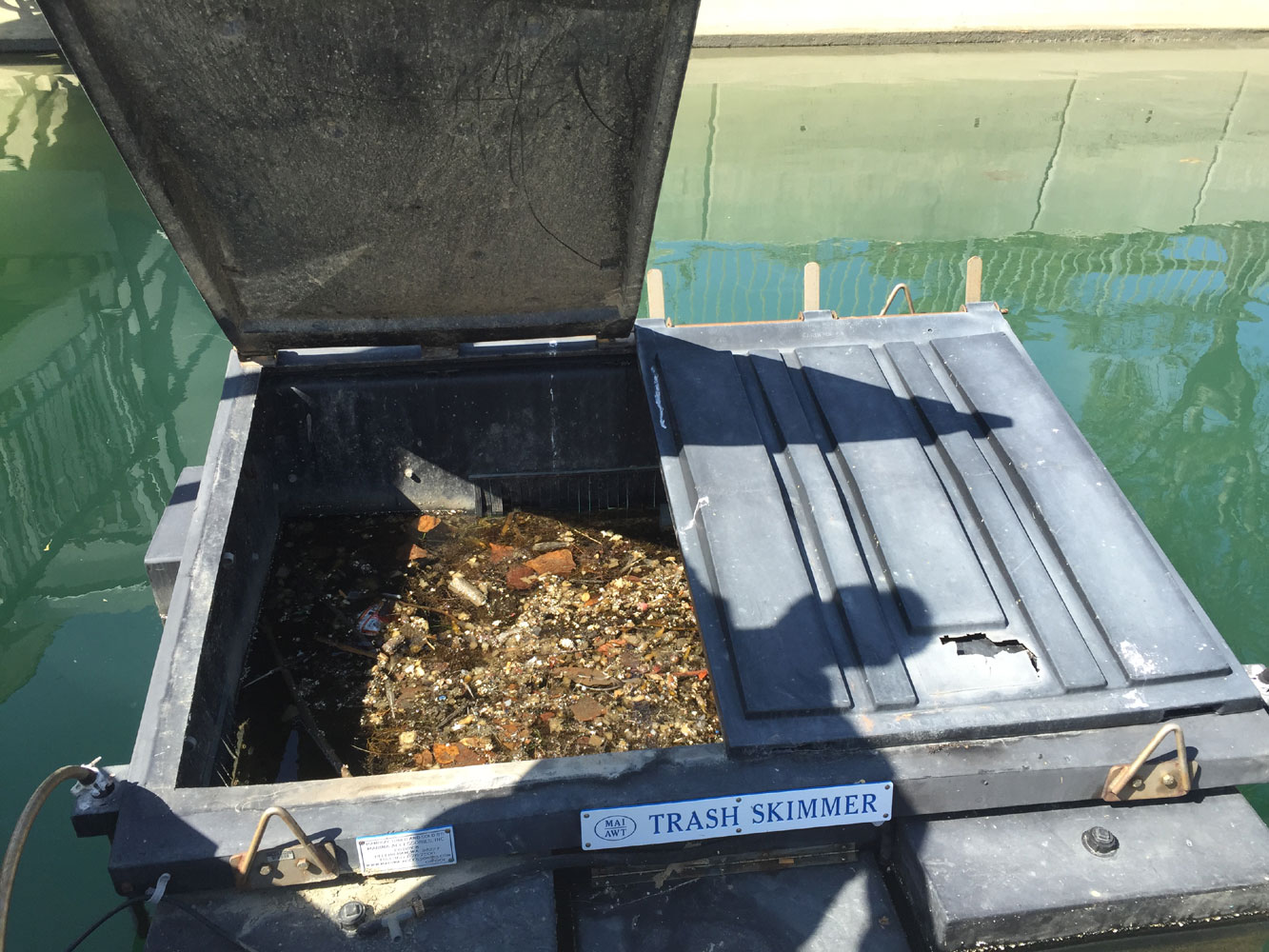 Trash skimmers in Dana Point, San Diego keep harbor waters clean