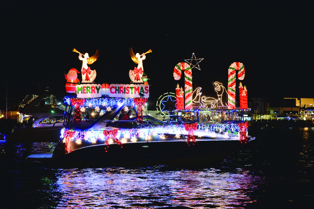 Candy canes, angels and a dragon help catch spectators attention during the Newport Beach Christmas Boat Parade.