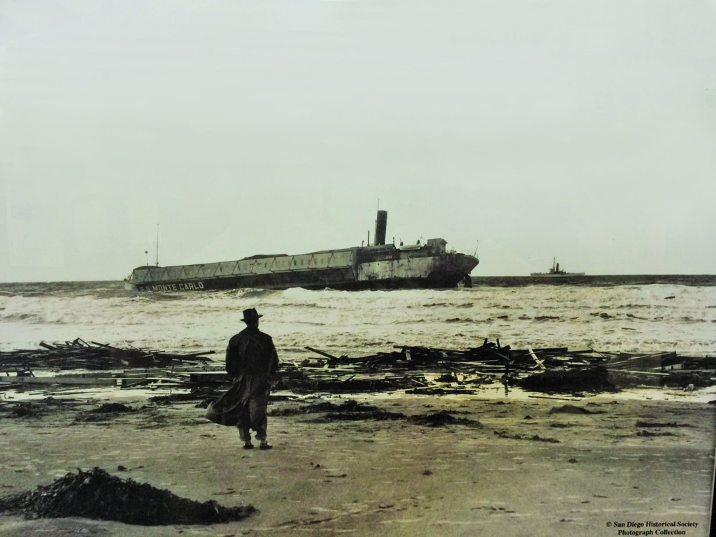An onlooker observes the beached Monte Carlo stuck just off the Coronado coast. Photo courtesy city of Coronado