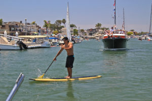 standup paddleboarder in Newport Beach Harbor